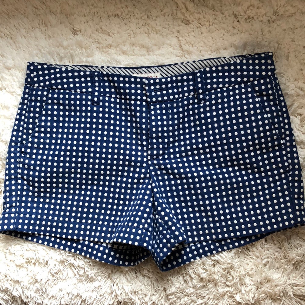 Women’s blue and white polka dot shorts.